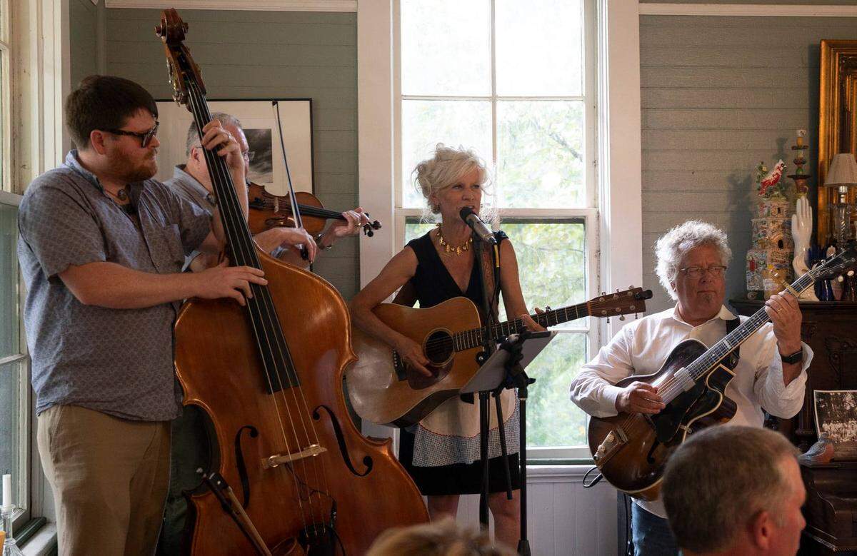 Robin Macy, second from right, performed a few songs at the Monday night’s “Live From the Whistle Stop Cafe” dinner at the Bartlett Arboretum.