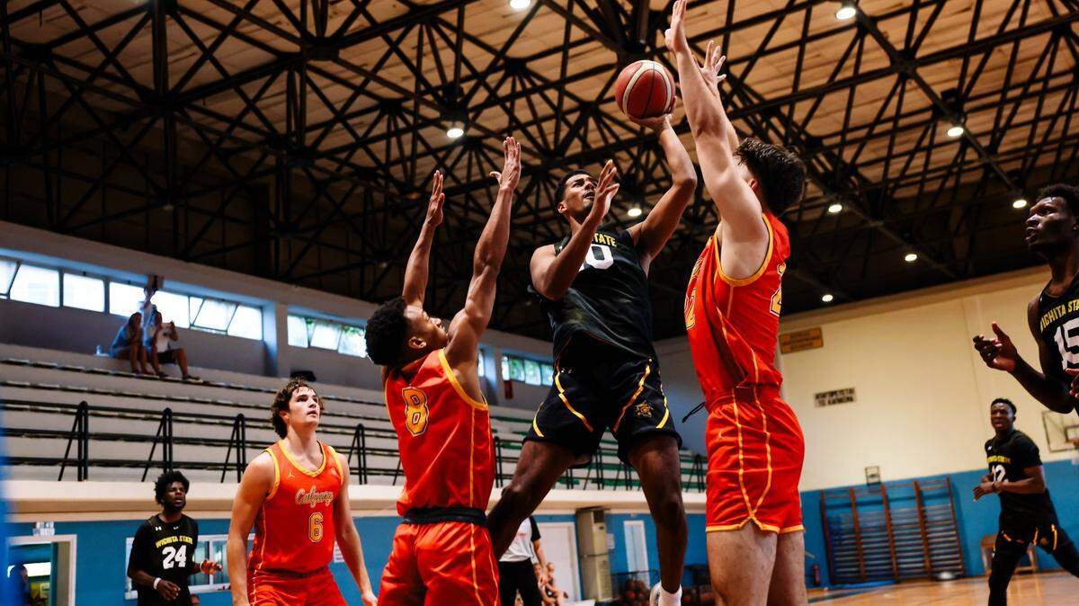 Wichita State’s Harlond Beverly attacks the defense of the University of Calgary in an exhibition game Wednesday in Zografou, Greece. The Shockers won the game 84-73 to conclude their overseas trip.