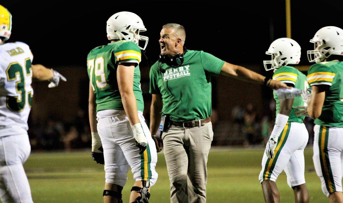 Derby football coach Brandon Clark and offensive lineman Alex Conn