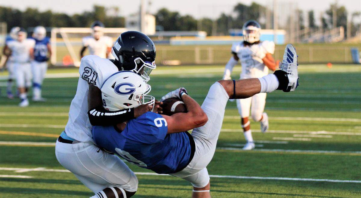 Wichita East’s Tavi Agnew and Goddard’s Kaeden Hoefer