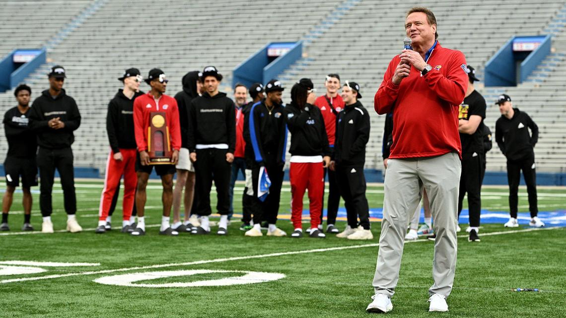 KU coach Bill Self addresses the thousands of fans who turned out to David Booth Kansas Memorial Stadium in Lawrence on Tuesday, April 5, 2022, to welcome home the Kansas Jayhawks men’s basketball team. KU beat the North Carolina Tar Heels 72-69 in the NCAA championship game in New Orleans on Monday night.