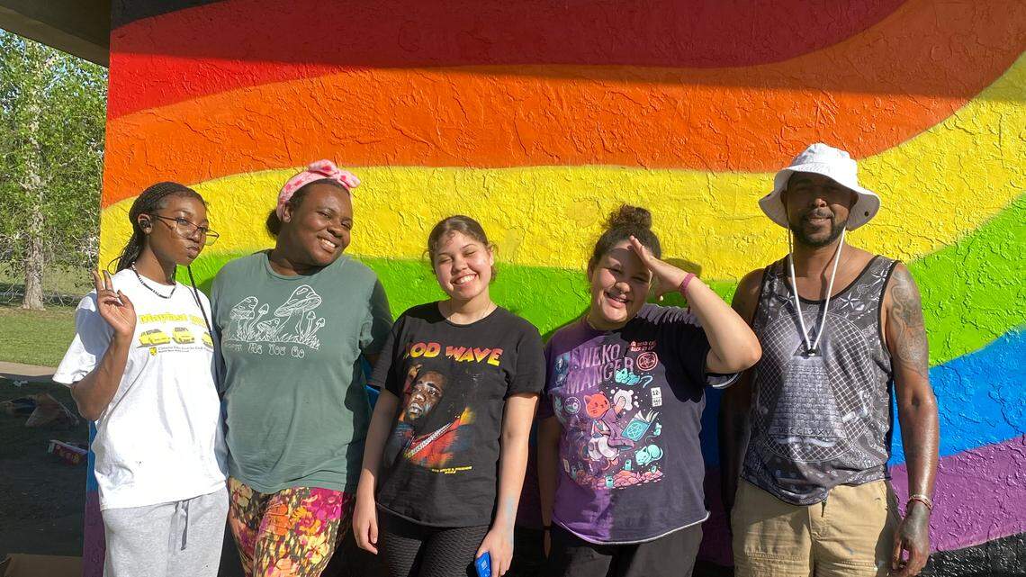 Dominique Joiner, second from left, and Baxter “Slim” Suber, right, are two of the mentors helping young artists such as, from left, Brooklyn Hicks, Monikah Jones and Izary Rodriguez through the Meet the Challenge mentorship program Joiner’s husband, Anthony, not pictured, started. The program will be housed at the new Mulberry Art Center across from Revolutsia, where the Mulberry Art Gallery is.