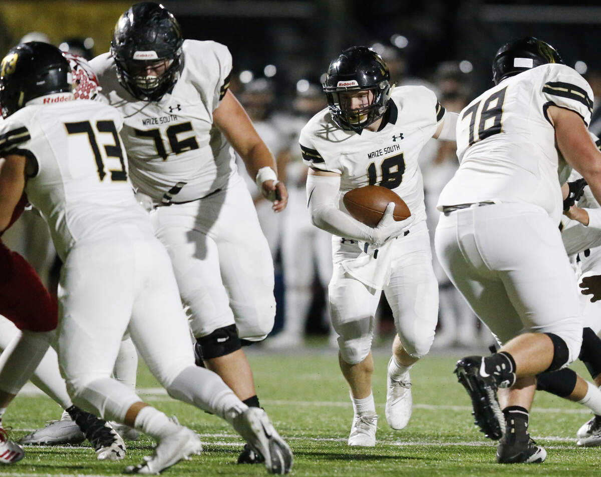 A hole opens up for Maize South running back #18 Mason Edwards Friday night as Maize South took on Maize. (November 2, 2018)