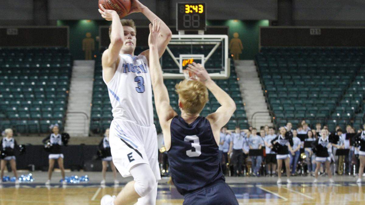 Eisenhower senior point guard Dylan Vincent scores 22 in the Tigers' 68-64 loss to Mill Valley in the first round of the Class 5A boys basketball tournament Wednesday at the Kansas Expocentre in Topeka.