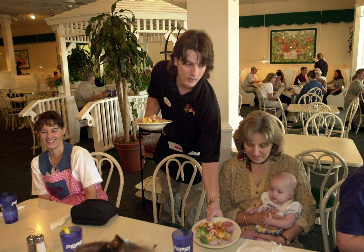 Garden Cafe had green carpet and tables set up in full-sized gazebos.