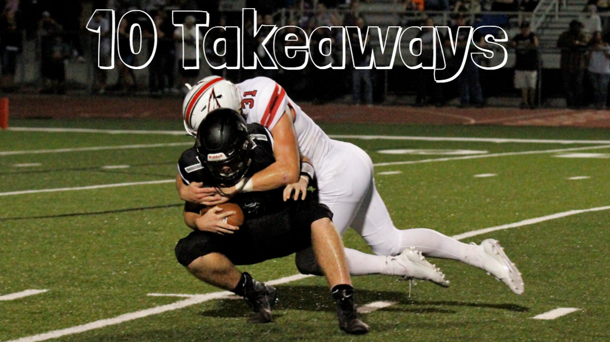 Maize junior defensive end Keaton Robertson sacks Campus senior quarterback Evan Kruse during the Eagles’ 21-0 win over the Colts on Friday night. (Sept. 14, 2018)