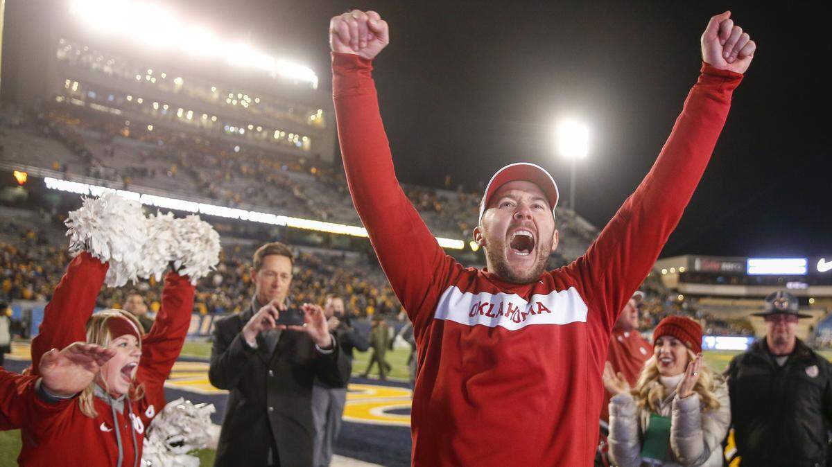 Oklahoma coach Lincoln Riley yells after the team’s 59-56 win over West Virginia during an NCAA college football game in Morgantown, W.Va., Friday, Nov. 23, 2018. Oklahoma earned a spot in the Big 12 championship game. (Ian Maule/Tulsa World via AP)