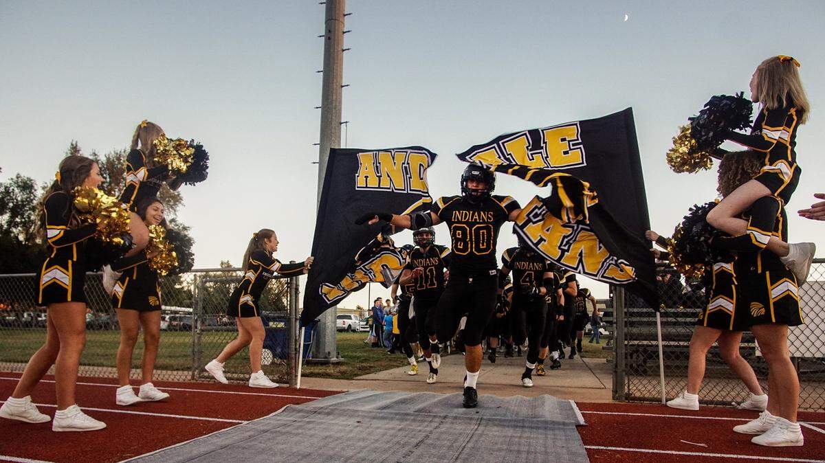 The Andale Indians run onto the field prior to the game against Wichita Collegiate at Andale High. (Oct. 7, 2016)