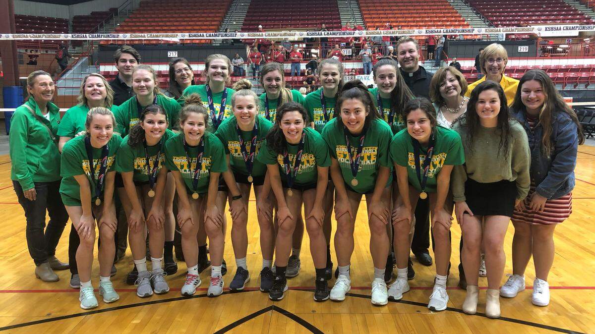 Bishop Carroll poses as a team after finishing fourth at the 2018 Kansas high school state volleyball tournament on Saturday Oct. 27.