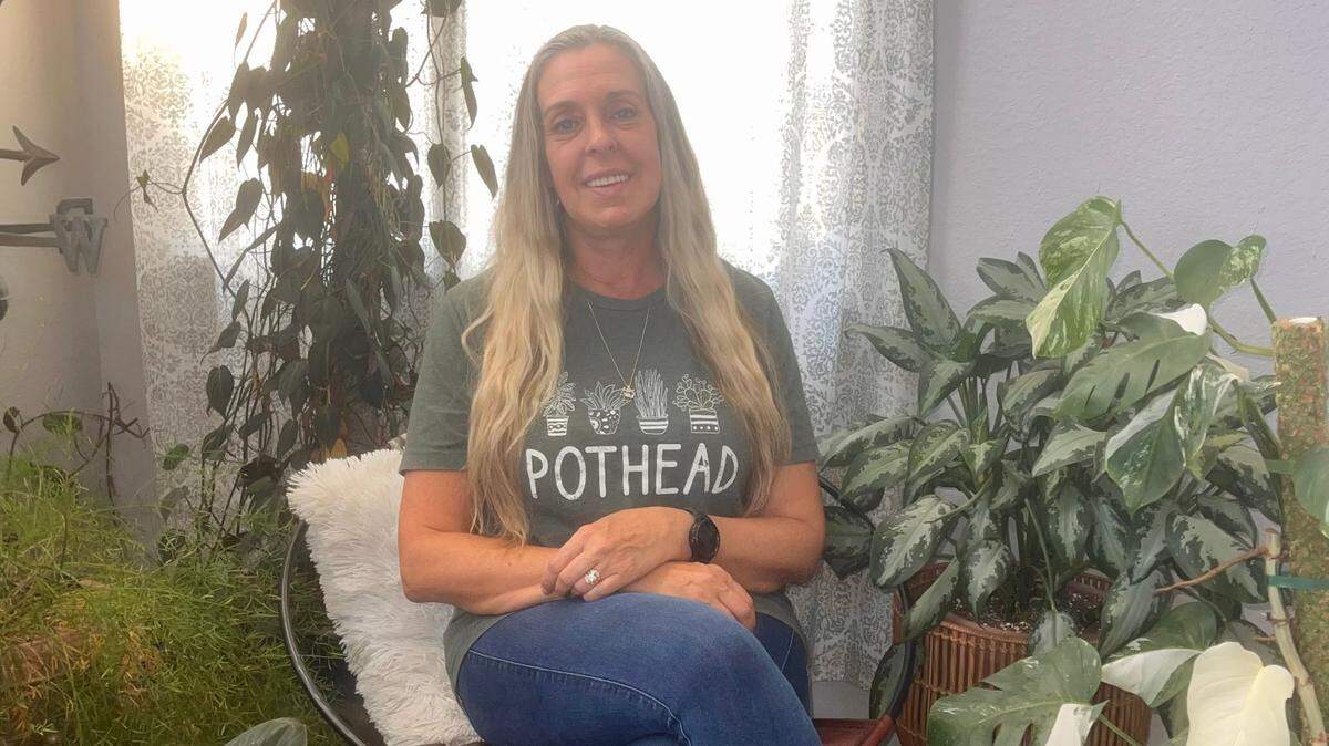 Angie Hart, pictured, is about to open Rooted in Nature, which will sell plants and have a gift shop that will carry plant-related T-shirts, like ones that say pothead, a reference to houseplants.