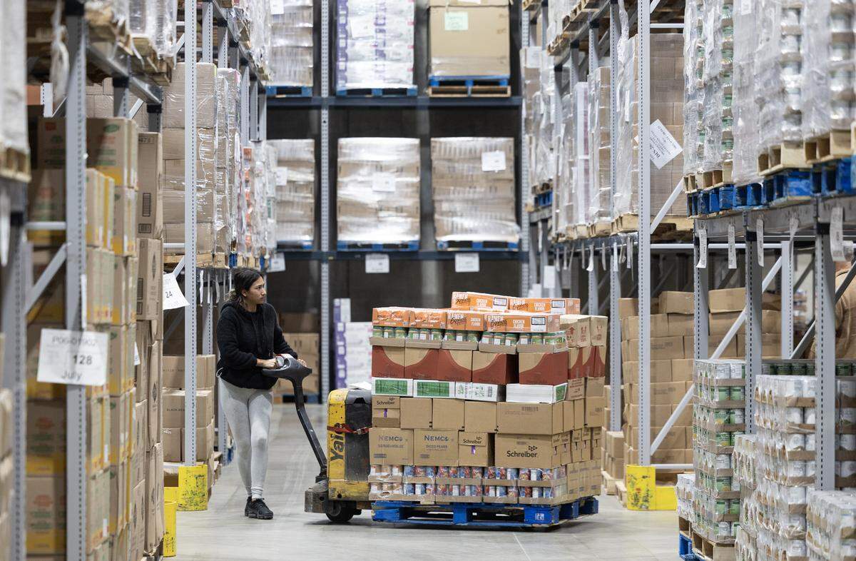 Food gets moved around on pallets at the Kansas Food Bank warehouse Tuesday Oct. 28, 2025. The food bank is hoping to get additional community support over worry about what effect the pause in federal benefits might have on hungry Kansans.
