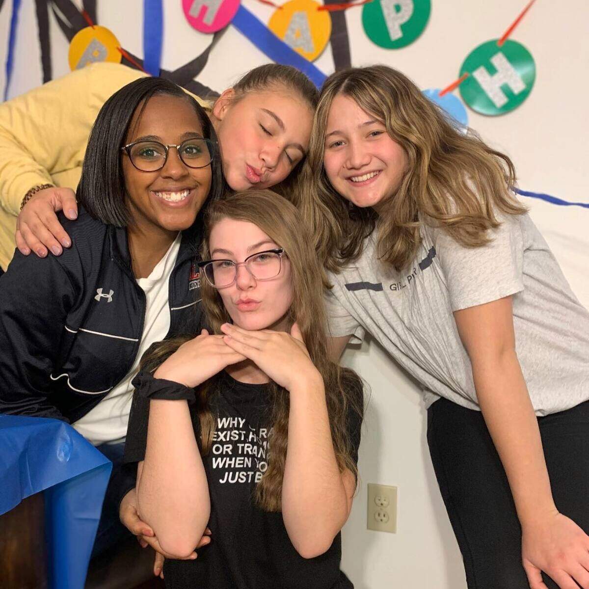 Back from left to right: Whitney Mayberry, Caitlyn Meraz and Tyla PrudHomme-Delodder suprise Brittnee Wicker (center) for her 20th birthday. Wicker’s mother called the group the Four Musketeers.
