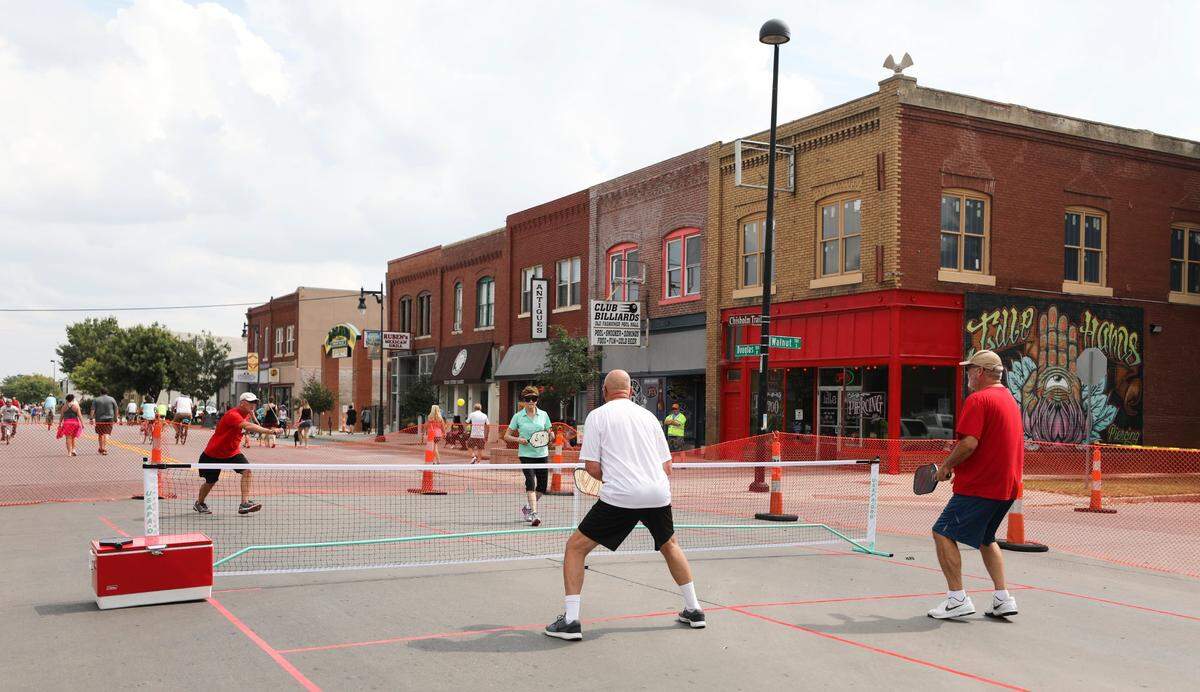 A pickleball court was set up in the middle of Douglas in 2017 as part of Open Streets ICT.