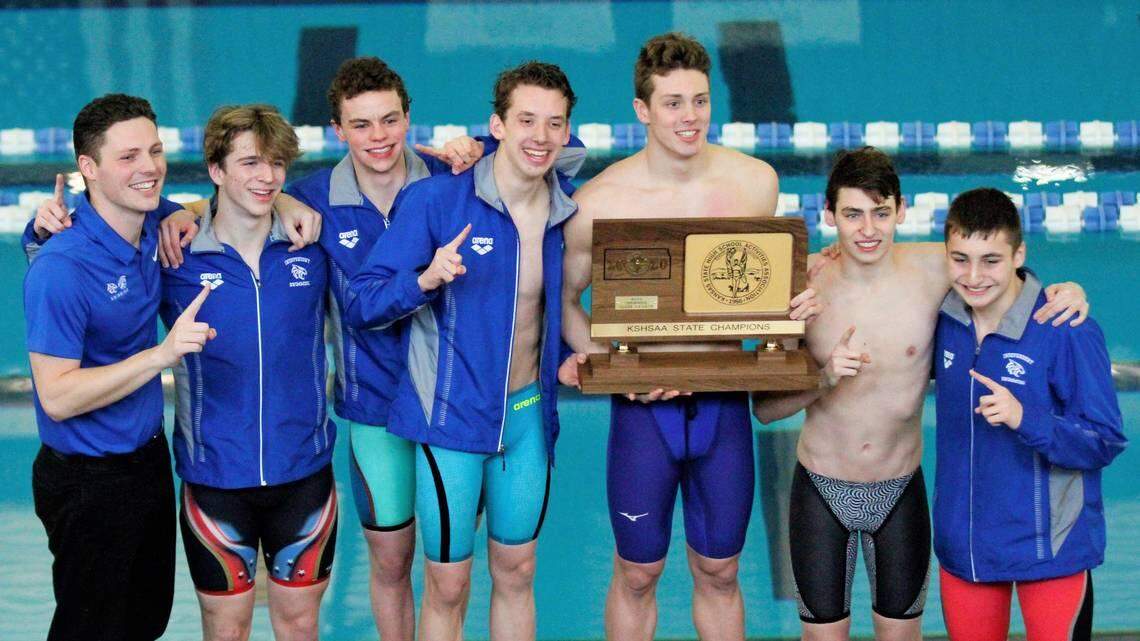 Wichita Independent state championship boys swimming and diving team (left to right): Coach Mitchell Wagner, junior Joshua Jacobsen, sophomore Matthew Janssen, senior Edward Sturm, senior Aidan Scott, junior George Jekov and sophomore Daniel Jekov.