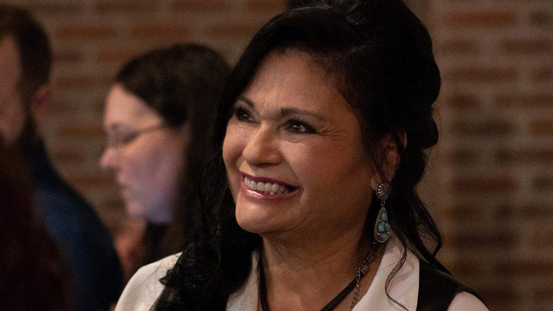 Hazel Stabler, a candidate for USD 259 BOE, watches election results during a party at B&C Creations. (November 2, 2021)