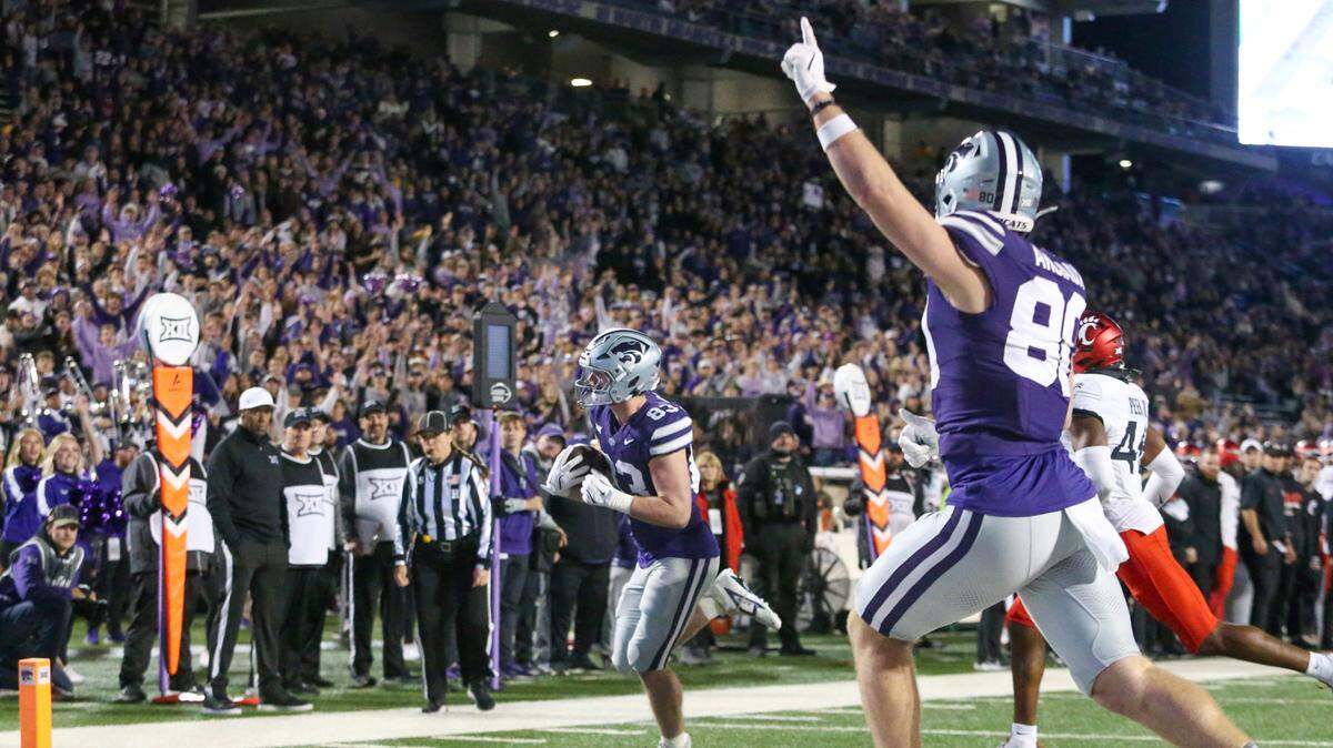Kansas State Wildcats tight end Will Anciaux (80) celebrates a touchdown by tight end Will Swanson (83) during the fourth quaerter at Bill Snyder Family Football Stadium.