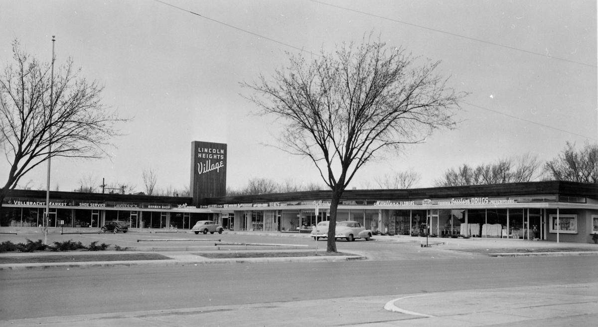 This vintage photo of Lincoln Heights Village at Douglas and Oliver shows the early businesses that were at the center, which was the first of its kind in Wichita. It also shows the ample parking lot, which was unusual for that time.