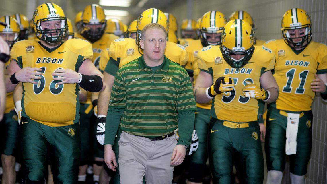 North Dakota State head coach Chris Klieman and his team. (AP Photo/Bruce Crummy)