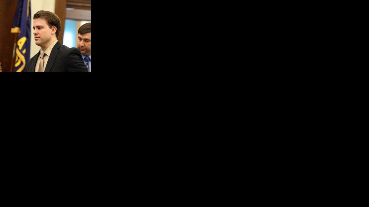 Brett Seacat enters the courtroom before the beginning of testimony Wednesday. Seacat is charged with first-degree murder and aggravated arson in the shooting death of his wife, 34-year-old Vashti Seacat. (June 5, 2013)