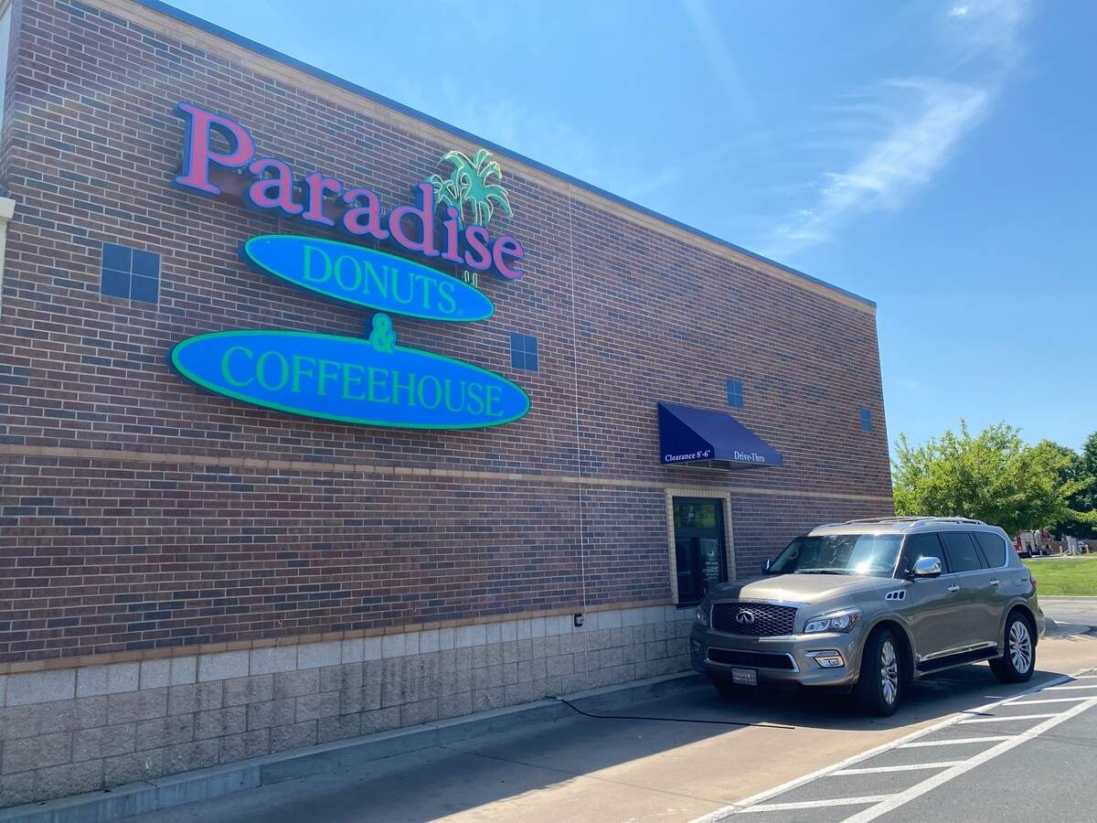 Marilyn and Hervey Wright own two local Paradise Donut stores: the one pictured above near Maple and Maize, which has a drive-through, and one downtown across from Naftzger Park on Douglas.