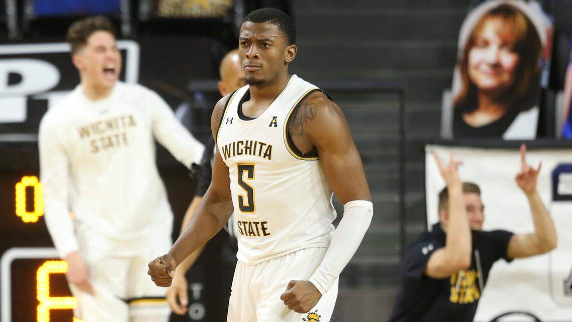 Wichita State University’s Trey Wade cheers after his teammate Tyson Etienne was fouled on a play in the final minutes of a close game against Temple University at Koch Arena on February 7, 2021.