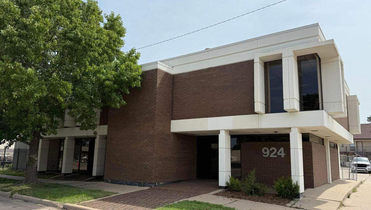 This brutalist-style building at 924 N. Main St. is home to Farha Construction, at least for now.