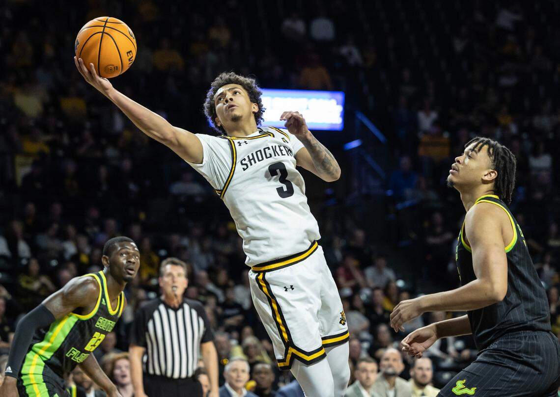 Wichita State’s Craig Porter Jr., makes a layup during the first half of their game against South Florida on Sunday. It was WIchita State’s final regular season game.