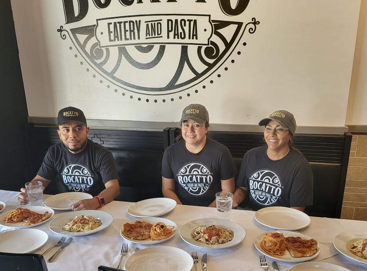 The staff of Bocatto: Pasta and Eatery in Old Town Square, which opens this week