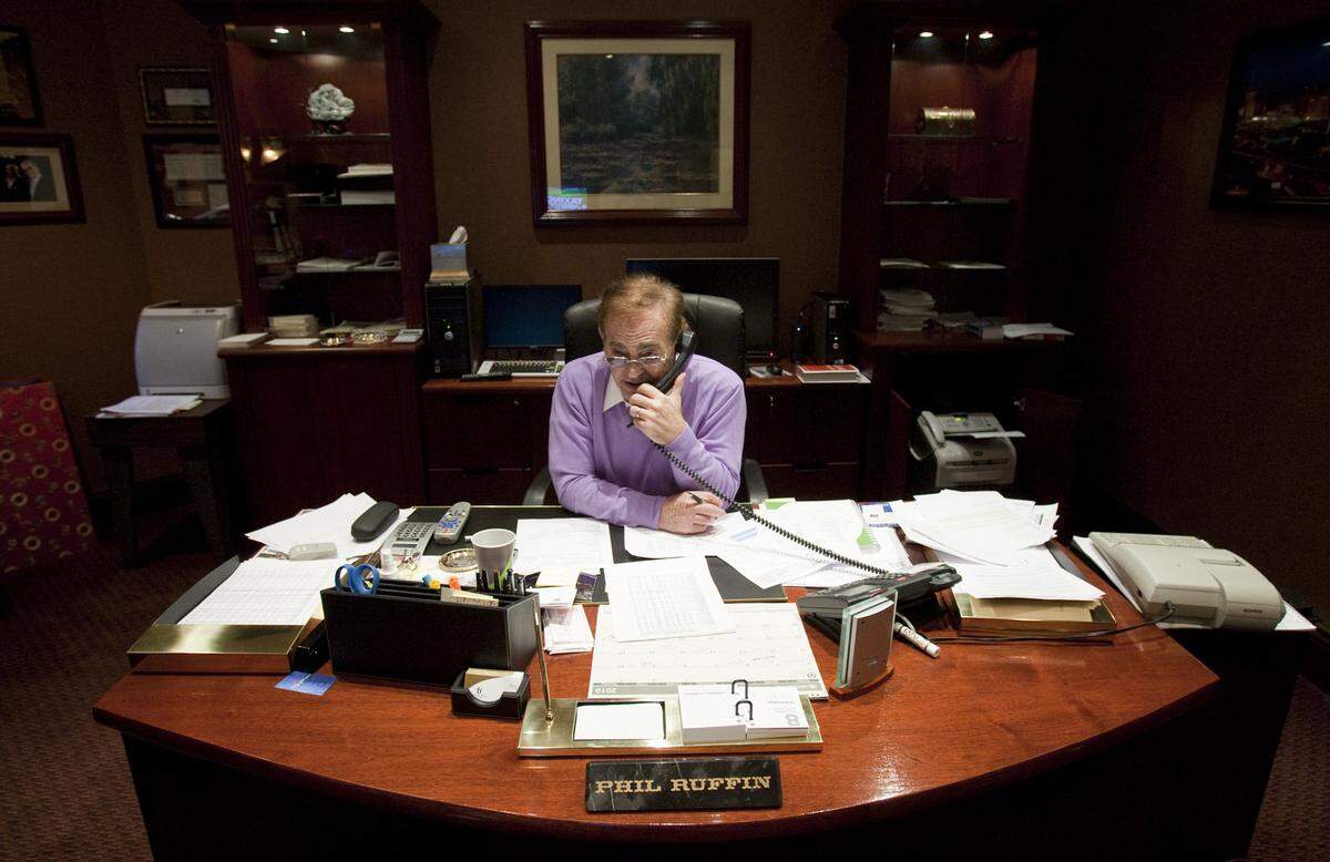 In this 2010 file photo, Phil Ruffin Sr. talks on the phone inside his office at Treasure Island.