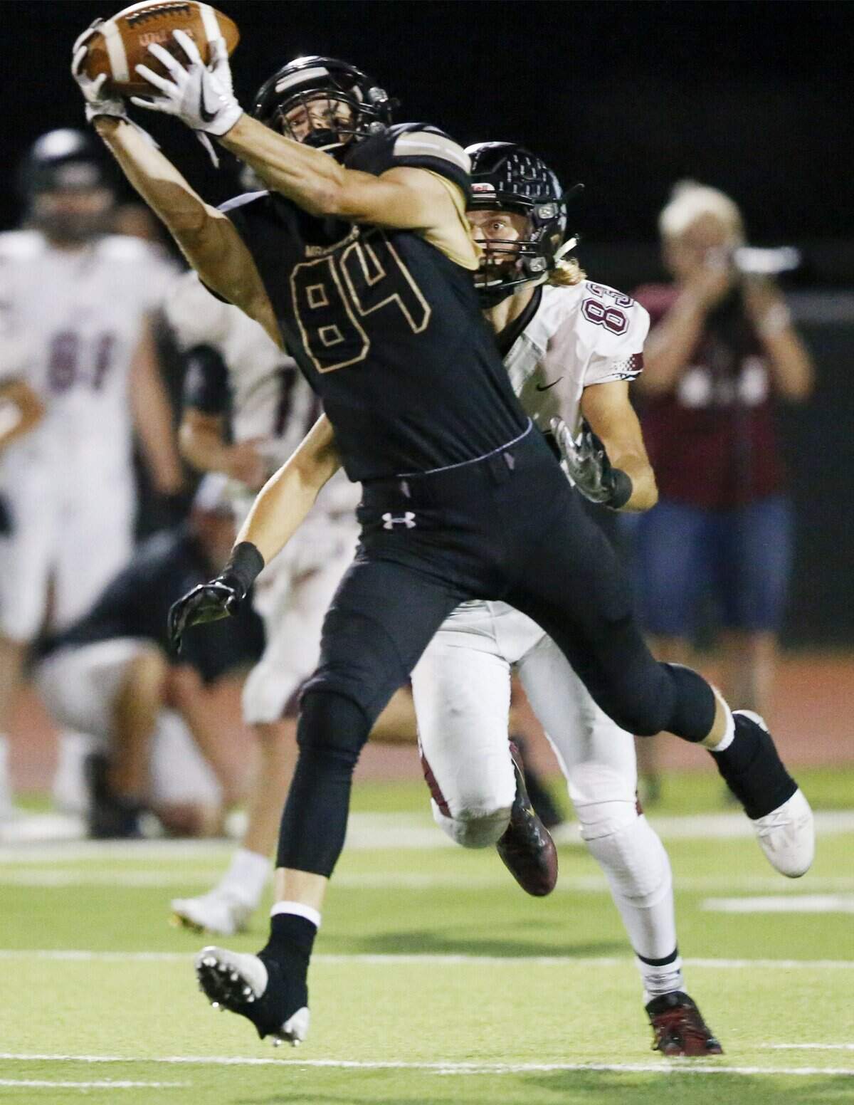 Maize South’s Nolan Veenis (84) hauls in a pass against Buhler in the fourth quarter as they try to mount a final drive. Maize South came up short and lost to Buhler 17-14 at Maize South Friday. (Sept. 22, 2017) 