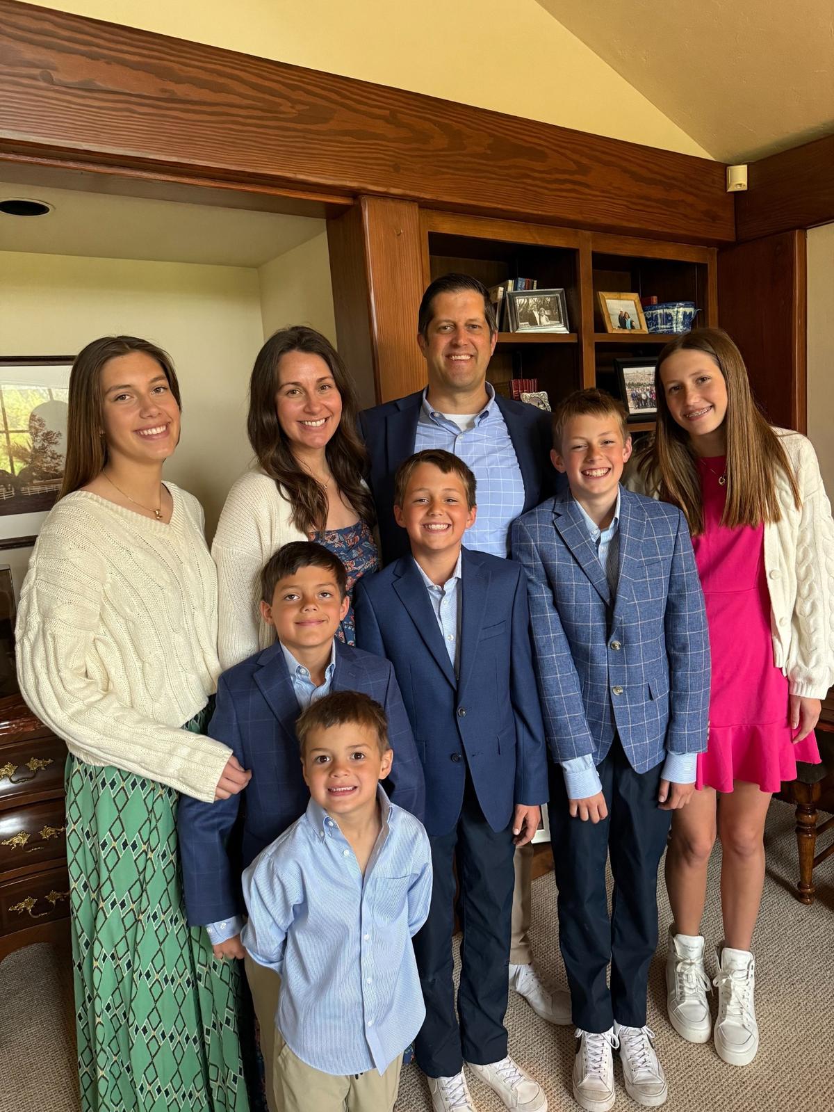 The Rolph family at Easter this year, including, from left on the back row, Emma, Lauren and Jon; and, from left on the second row, Austin, Peter, David and Olivia; and Bear on the front row.