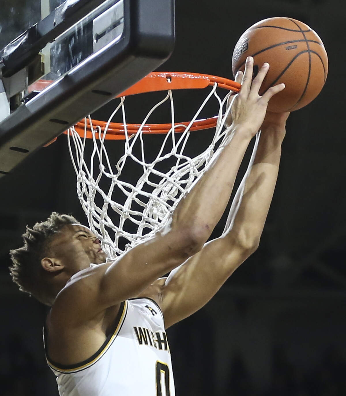 Wichita State guard Dexter Dennis just misses the alley-pop during the first half of their game against Jacksonville State at Koch Arena on Wednesday.
