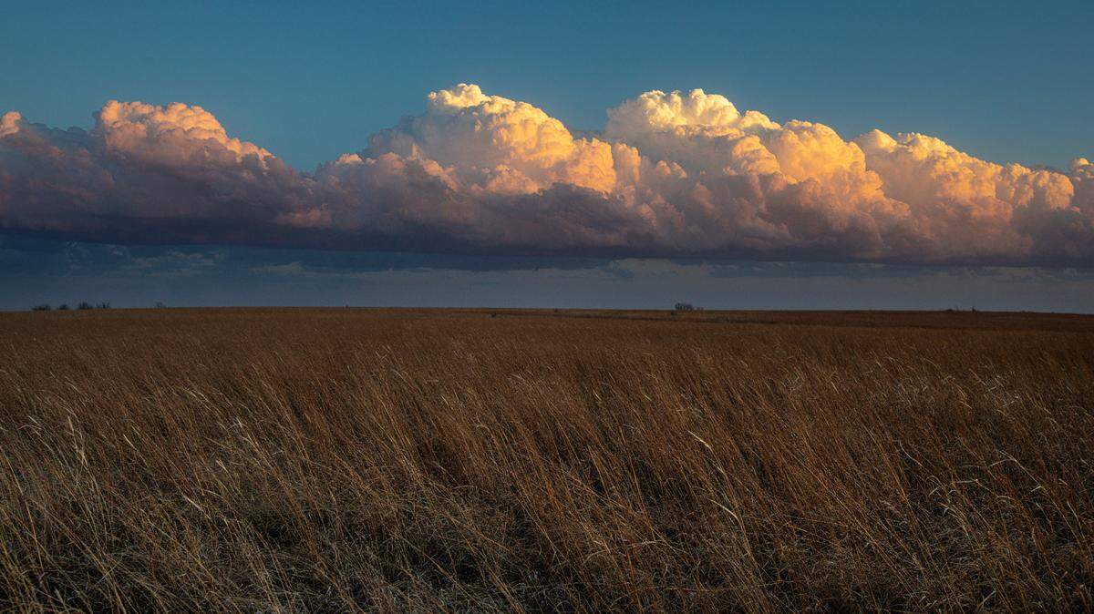 Building thunderstorm clouds form over the Flint Hills near Cedar Point.