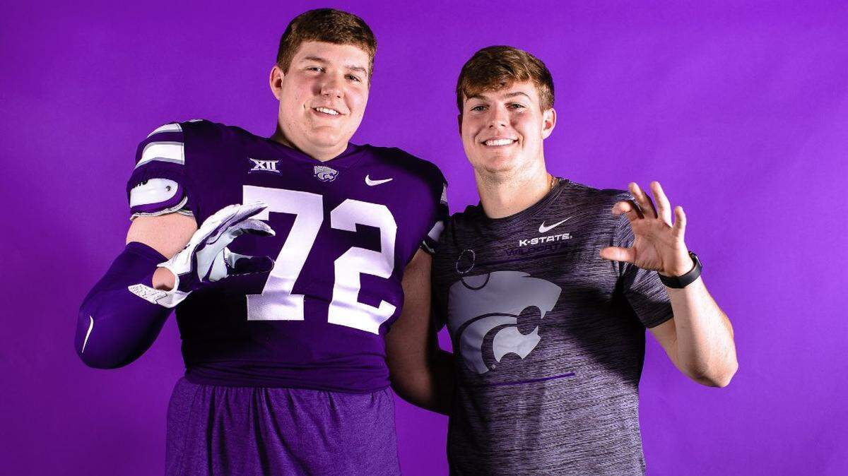 Kansas State football recruit Ryan Howard (left) poses for a picture with quarterback Will Howard.