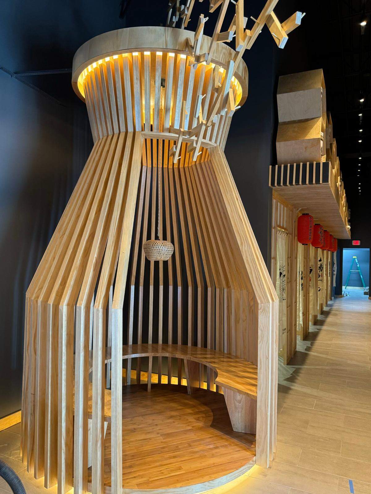 Kyuramen features two seating areas nicknamed “sake bottles.”