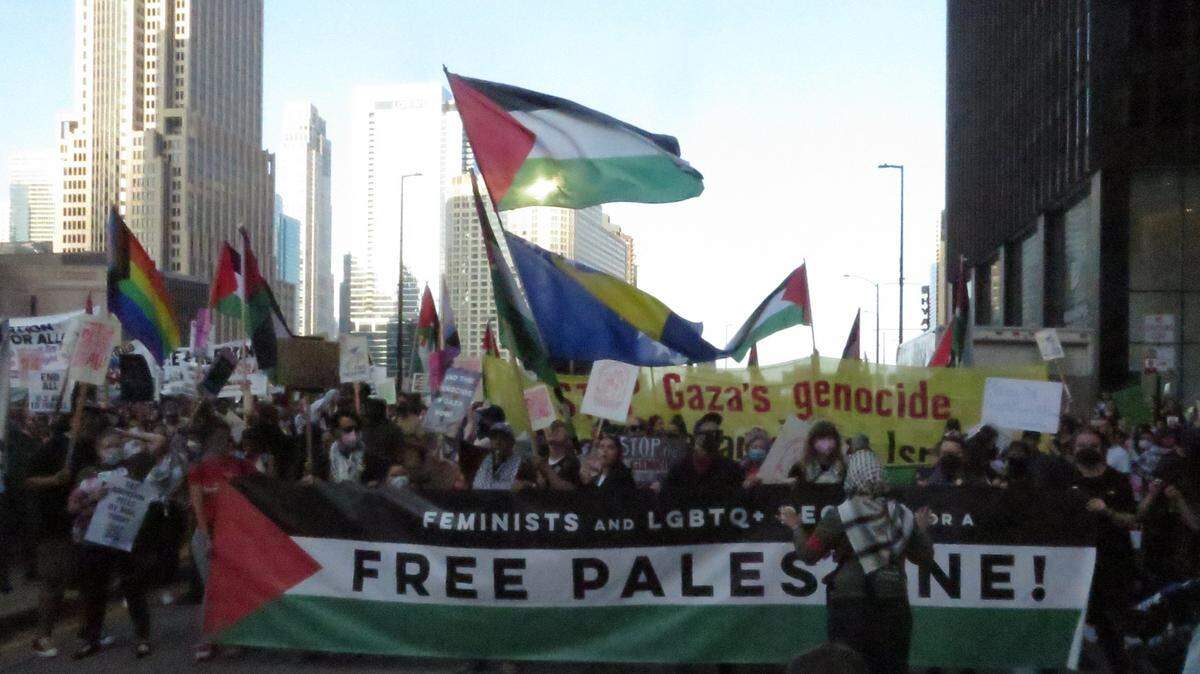 Pro-Palestinian protestors demonstrate in Chicago Sunday on the eve of the Democratic National Convention.