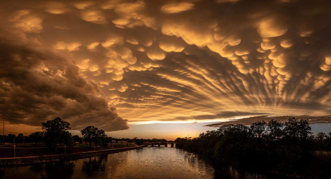 Mammatus clouds form over the Arkansas River after a line of thunderstorms passed through he Wichita area.