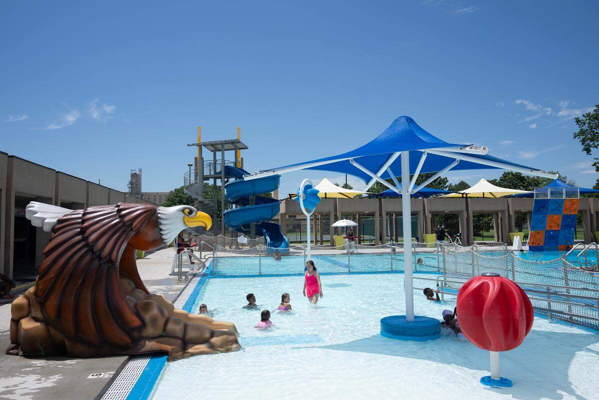 Charles McAfee Pool inside McAdams Park at 1240 E 14th St N.