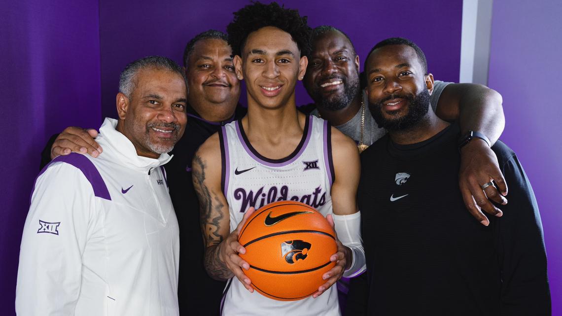 Kansas State freshman Dorian Finister poses with Jerome Tang and his coaching staff on a recruiting visit to Manhattan.