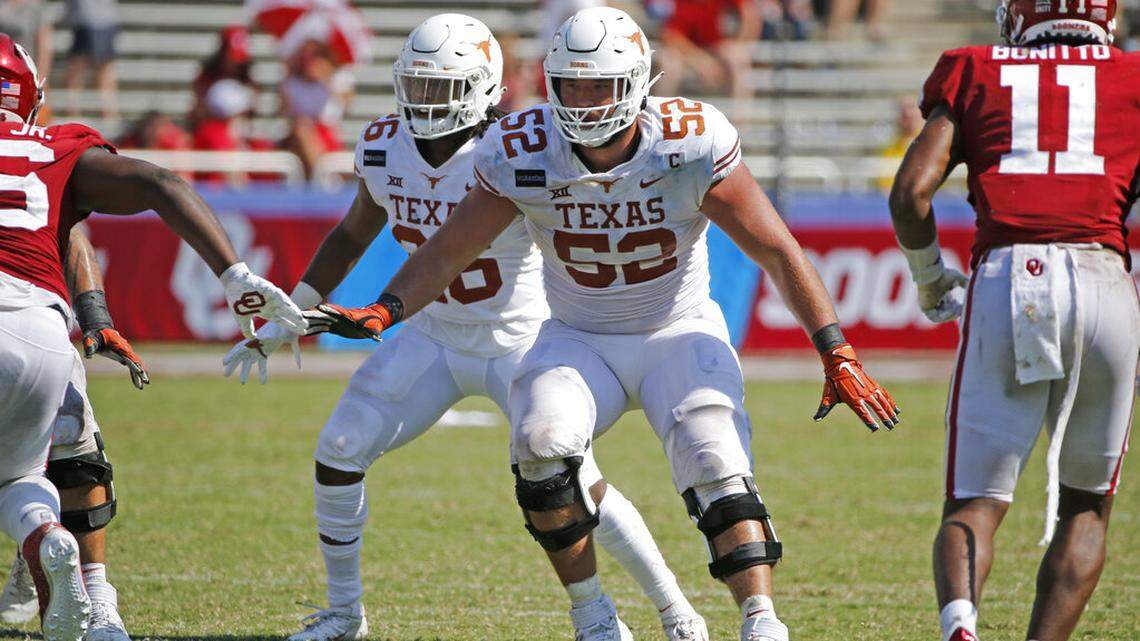 FILE - Texas offensive lineman Samuel Cosmi (52) prepares to block against Oklahoma during the second half of an NCAA college football game in Dallas, Texas, in this Saturday, Oct. 10, 2020, file photo.