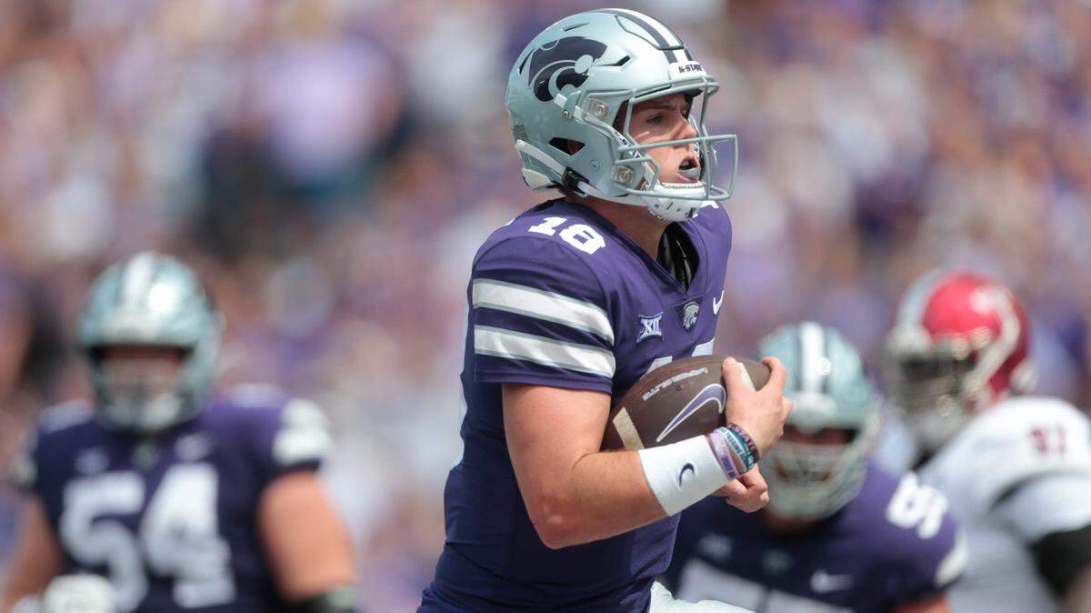 Kansas State senior quarterback Will Howard (18) runs in for a touchdown in the third quarter of Saturday’s game against Troy inside Bill Snyder Family Stadium.