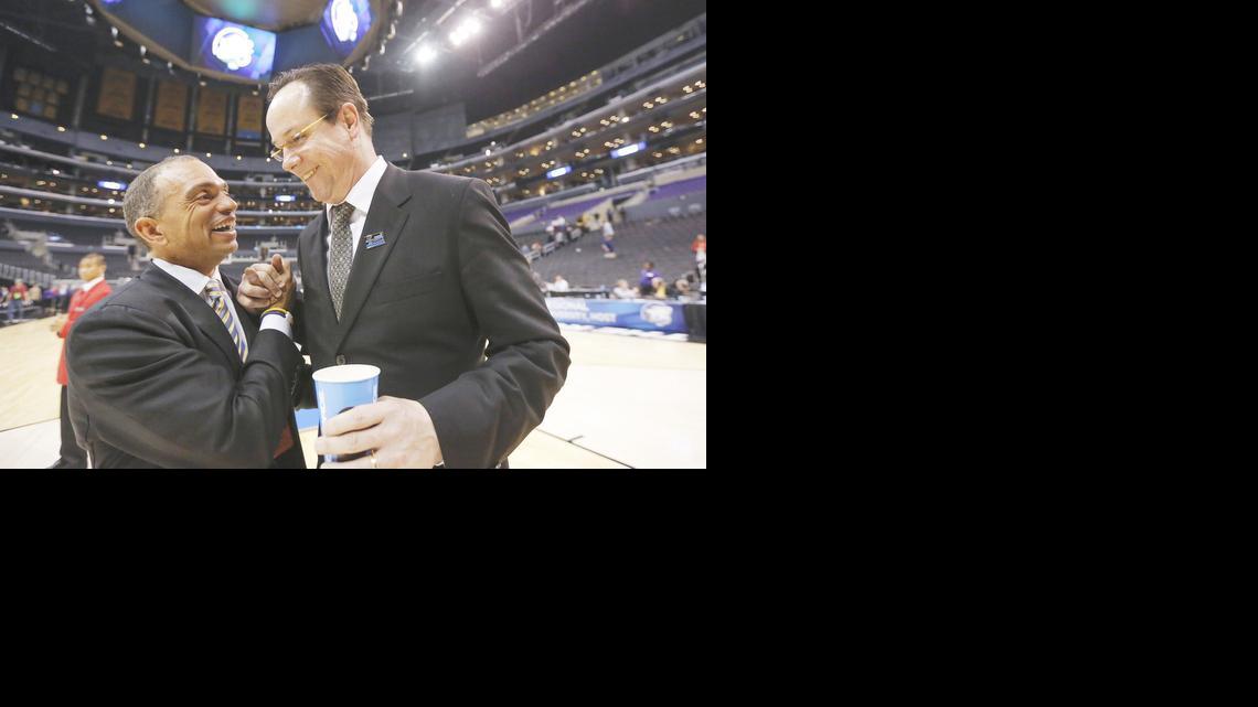Wichita State coach Gregg Marshall is congratulated by athletic director Eric Sexton after the Shockers won an NCAA Tournament game in 2013.

