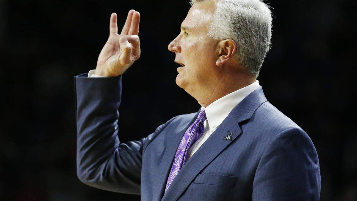 K-State head coach Bruce Weber signals instructions to his players Friday night during K-State’s home opener,(November 9, 2018)