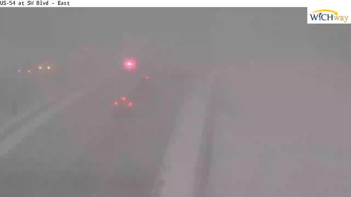 During the time of a snow squall warning, visibility in the Wichita area was around a quarter-mile, according to the National Weather Service. A screenshot of a highway camera around 8 a.m. shows the visibility of a police vehicle with lights on while responding to a stalled vehicle on Kellogg near Southwest.