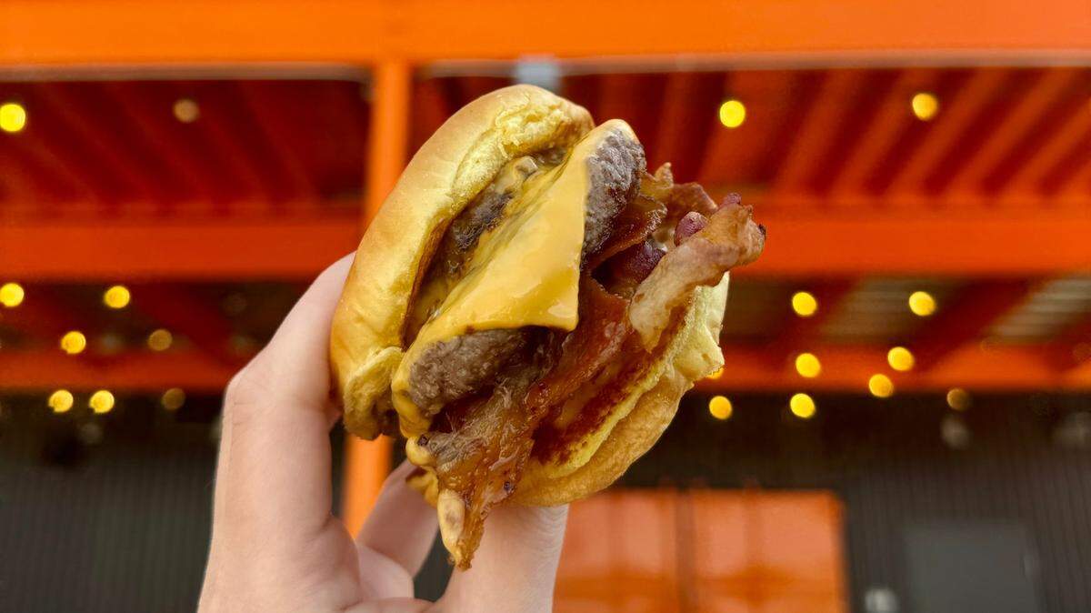 Smalls Sliders specializes in ... small sliders. The new restaurant’s menu also offers double sliders, grilled cheese sandwiches, waffle fries, shakes — even queso.