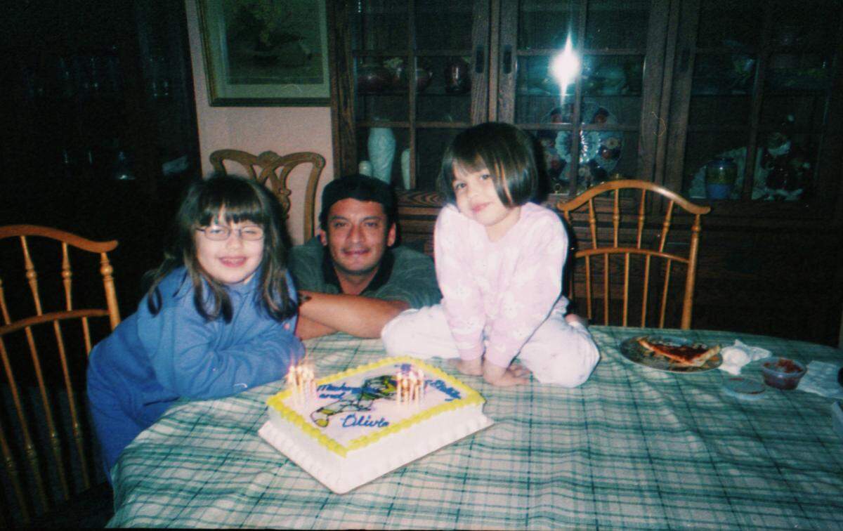James Rangel Jr. with his daughters, Olivia Borland, left, and Kenzie Borland-Massey, when they were little.