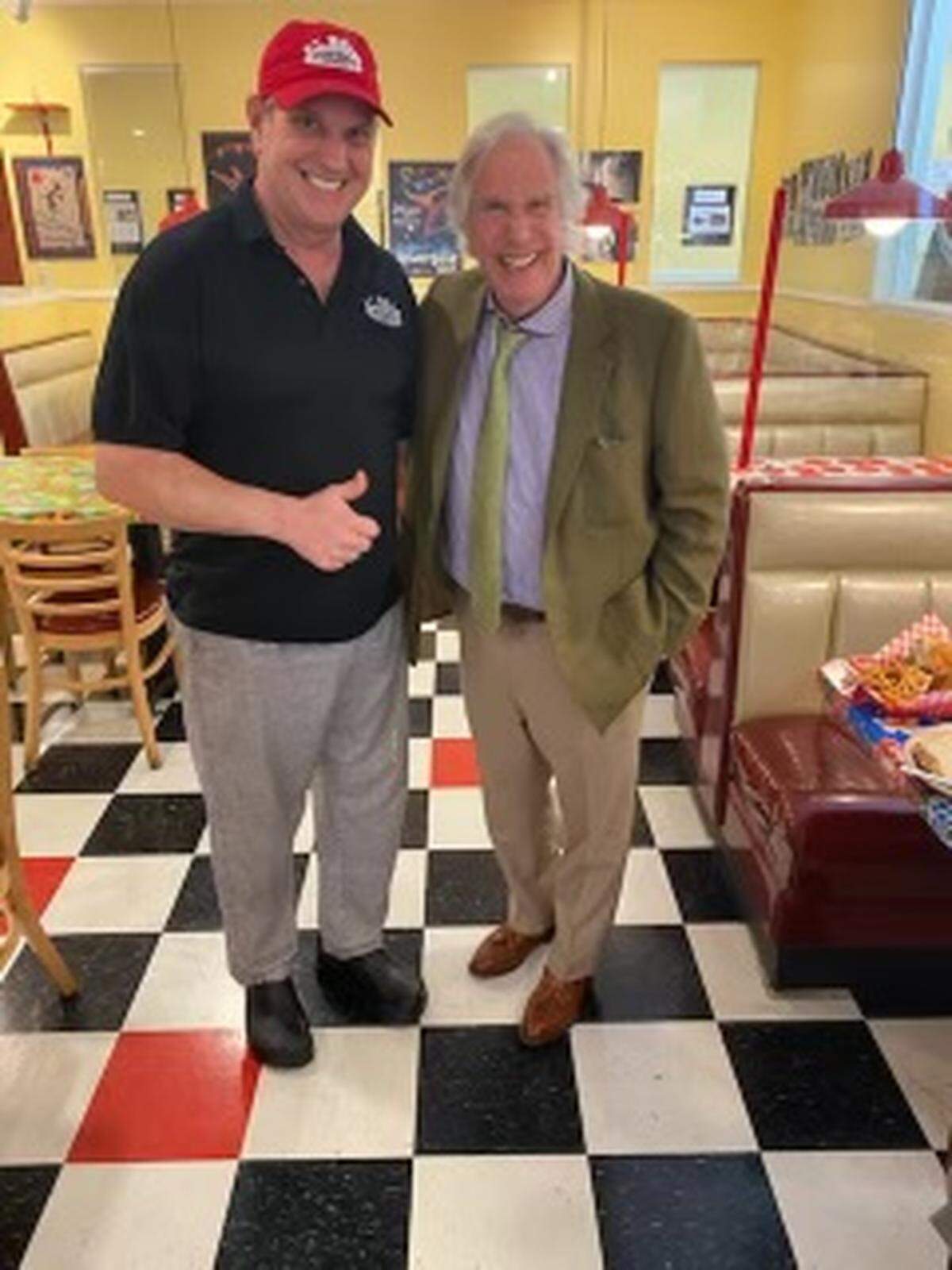 Doo-Dah Diner owner Patrick Shibley poses with famous actor Henry Winkler, who stopped in for lunch on Friday.