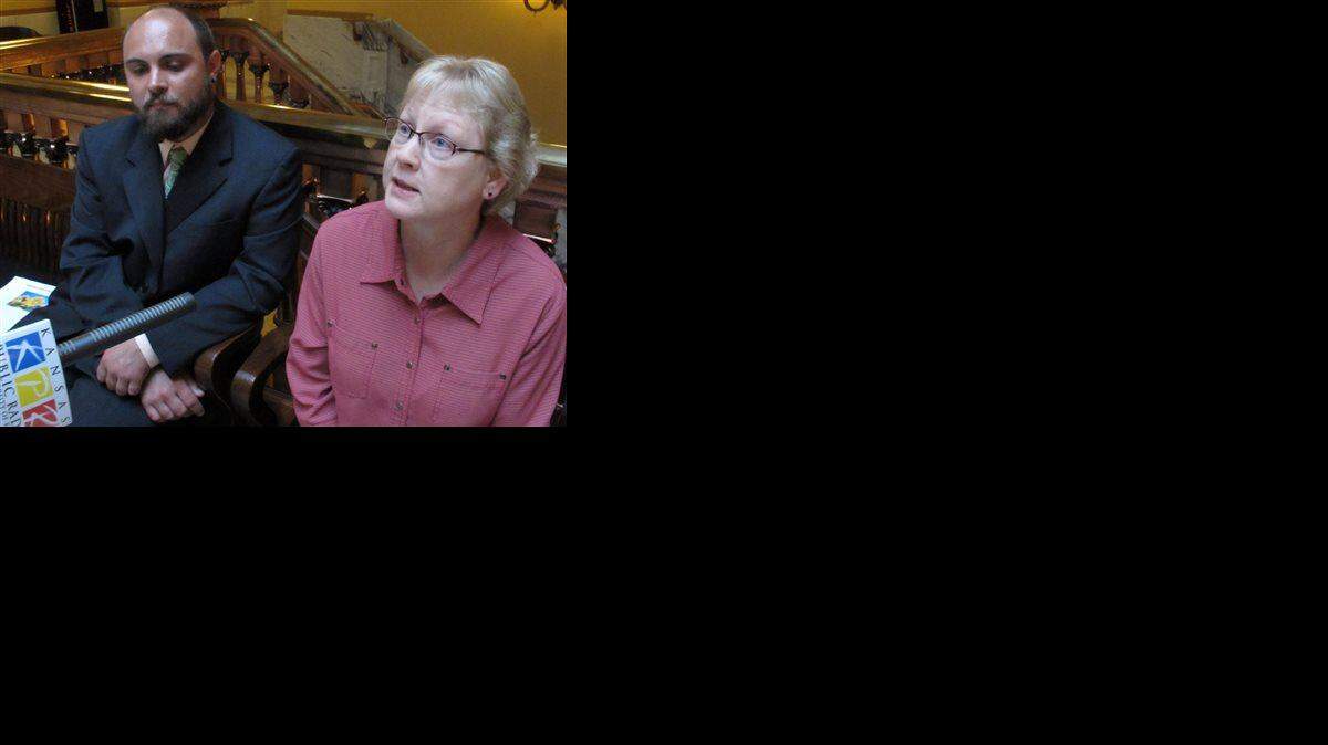 Kyle Nuckolls, left, and Lynette Lewis, right, workers at Kansas’ state mental hospital in Larned, answer questions from reporters after testifying before a joint legislative oversight committee, Monday, April 18, 2016, at the Statehouse in Topeka, Kan. They have told lawmakers that staffing problems at the hospital have created dangerous conditions there. 
