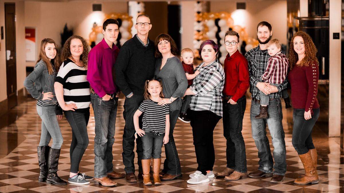 Wichita police Detective Matt Young died Tuesday from cancer. He is pictured here, center left, with his family. Funeral services are Saturday.