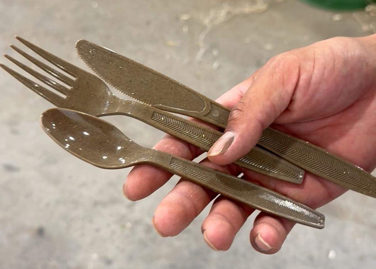 Jalen Leclere shows some of Prairie Band Ag’s first cutlery made from milled hemp hurd and plant resin.